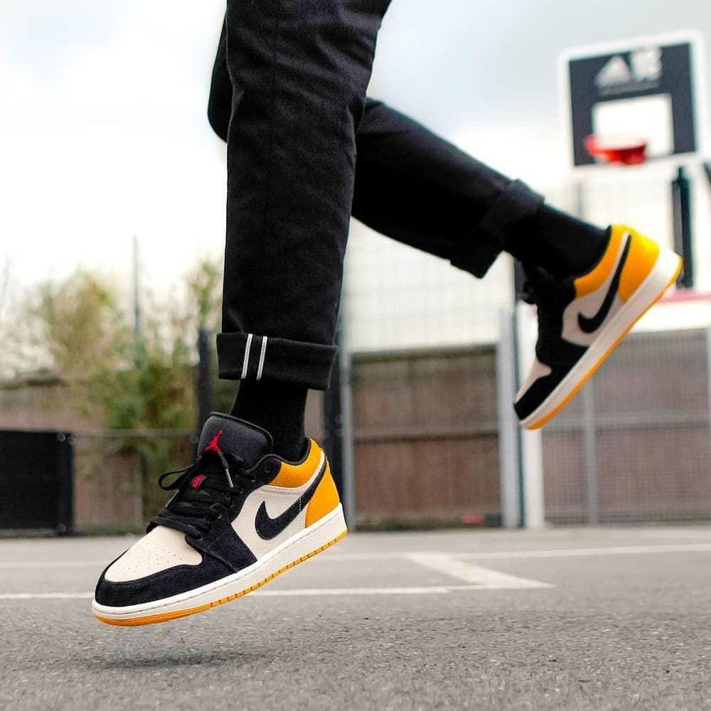 Jordan 1 low 2025 university gold on feet